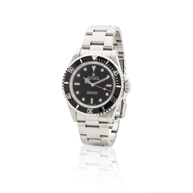 Rolex. A stainless steel automatic bracelet watch Rolex. Montre bracelet en acier mouvement automatique Submariner, Ref: 14060, Circa 1991