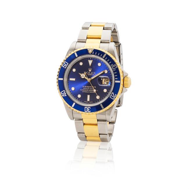 Rolex. An 18K gold and stainless steel automatic calendar bracelet watch Rolex. Montre bracelet en or jaune 18K (750) et acier avec date mouvement automatique Submariner, Ref: 16613, Circa 1988