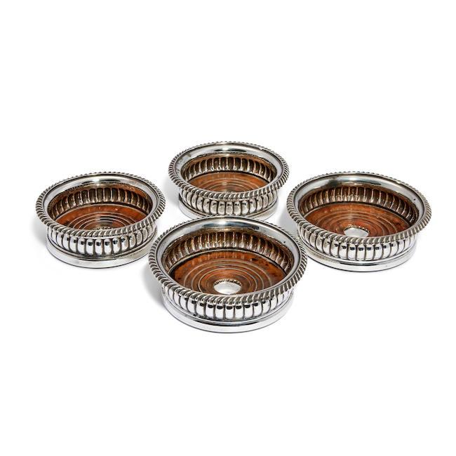 Two pairs of George III silver wine coasters Smith Tate and Co, Sheffield 1820 and 1822 (4)