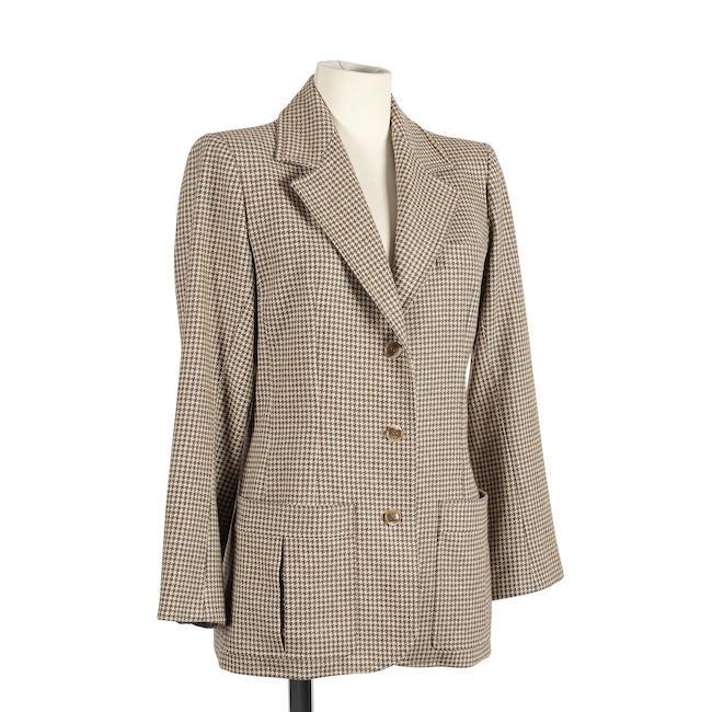 Saint Laurent Rive Gauche, collection Prêt-à-Porter, circa 1970. Veste longue en lainage pied de poule dans les tons beige.