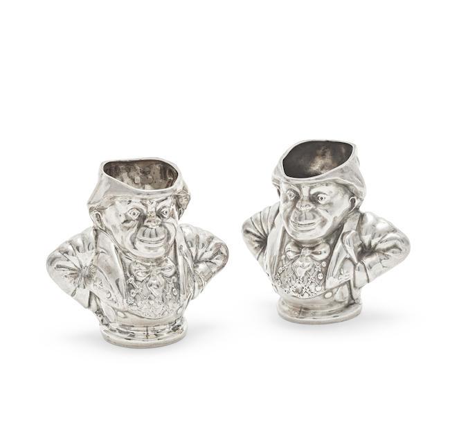 A pair of Edwardian novelty silver figural whiskey tots Jones & Crompton, Birmingham 1908 (2)
